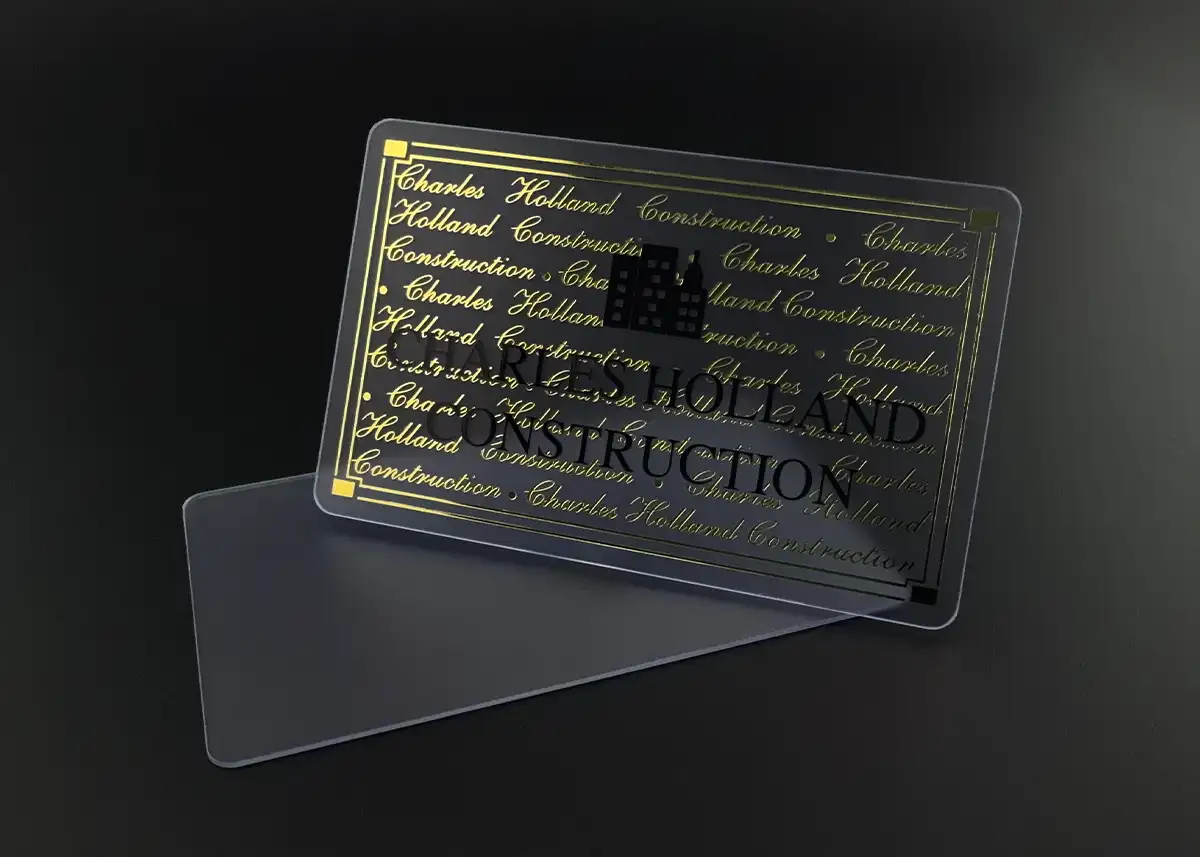 a frosted plastic card printed with metallic gold foil plus black ink
